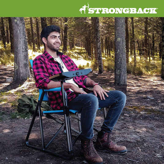 Photo of man in woods sitting STRONGBACK BLUE director chair